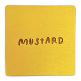 Photograph of a mustard color swatch