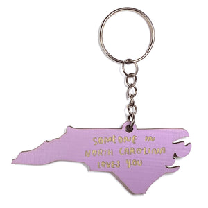 Photograph of Laser-engraved Someone in North Carolina Loves You Keychain