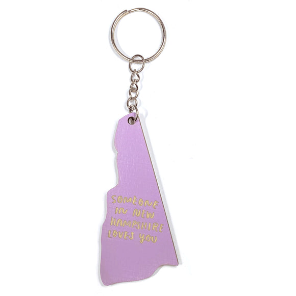Photograph of Laser-engraved Someone in New Hampshire Loves You Keychain