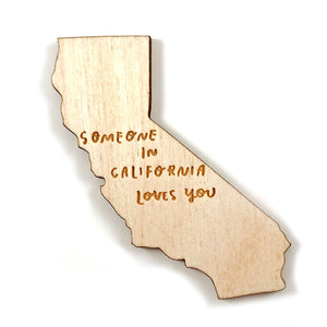 Photograph of Laser-engraved Someone in California Loves You Magnet