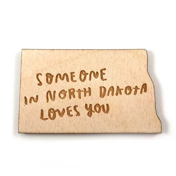 Photograph of Laser-engraved Someone in North Dakota Loves You Magnet