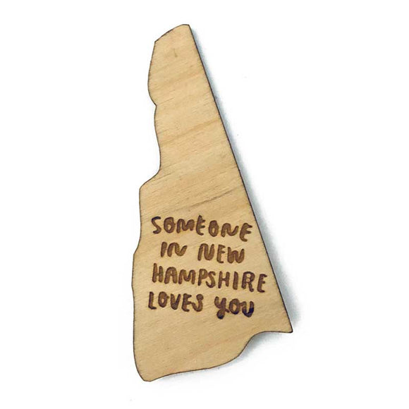 Photograph of Laser-engraved Someone in New Hampshire Loves You Magnet