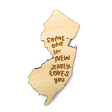 Photograph of Laser-engraved Someone in New Jersey Loves You Magnet